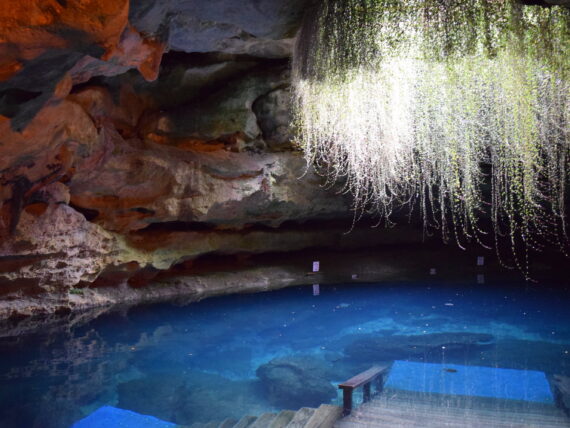 A swimming pool hole in a cave