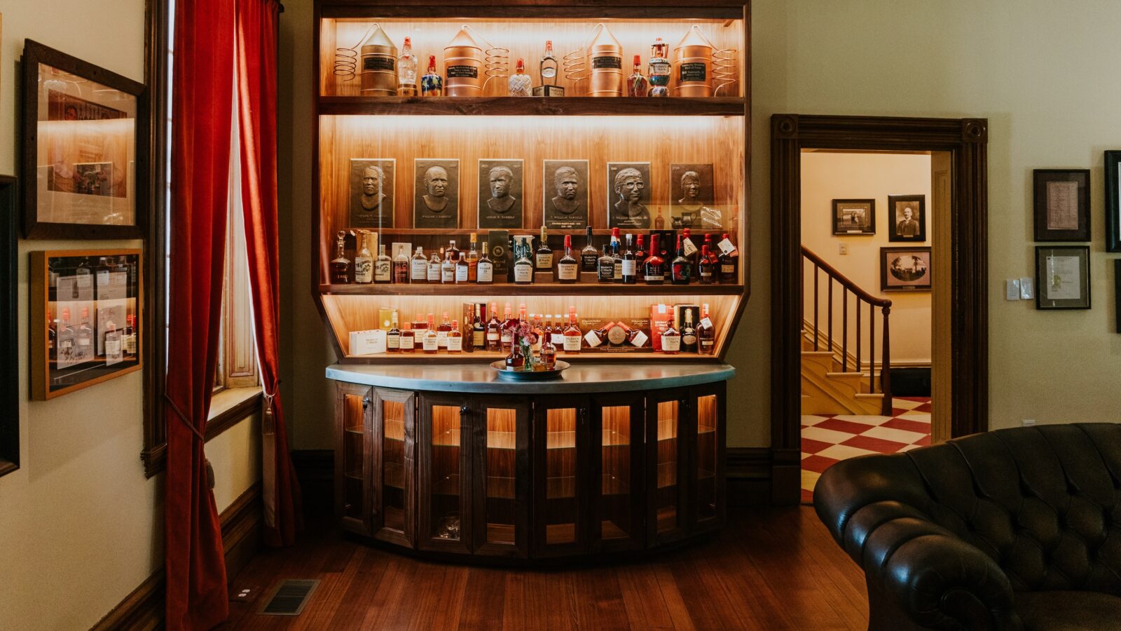 Inside a bourbon museum with shelves of bottles
